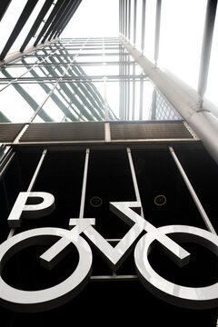 Clean commercial view of bicycle lane symbol on pavement showing urban architecture lines and perspective for transport in Berlin Germany