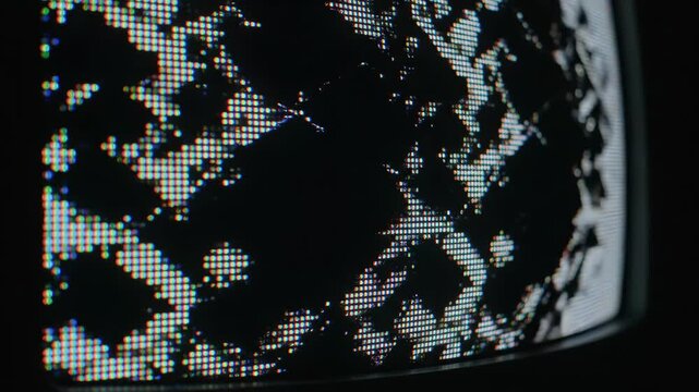 Close up view of cathode ray tube monitor screen showing rgb pixel matrix with signal interference lines and scan distortion for technological glitch effect.
