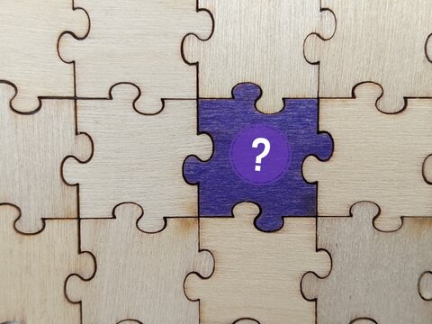 jigsaw puzzle pieces. Conversation bubbles and Question mark on jigsaw puzzle with missing piece. Concept of question, FAQ, Q and A, confusion and solution