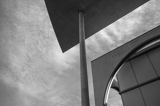 Canopy column and curve in monochrome as abstract architecture with modern minimal lines and geometry creating a calm graphic composition