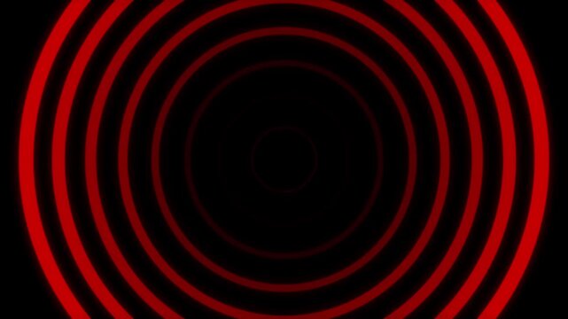 Futuristic concentric circles displayed or radar scanning over a black background.