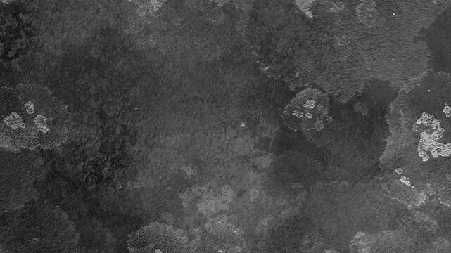 4K Cinematic dark grunge texture overlay featuring mottled dust, cloudy smudges, and peeling flaky patches on a dark background for VFX compositing.