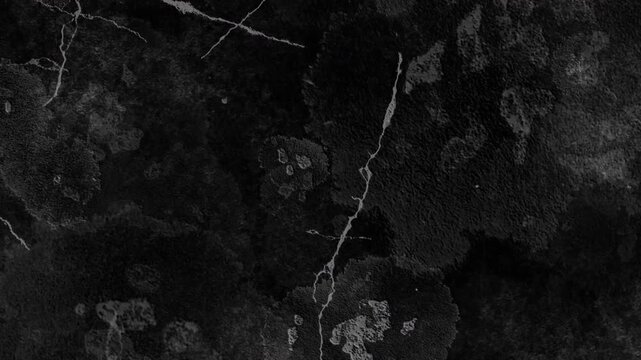 4K Cinematic dark grunge texture overlay featuring long white scratches, analog hair fibers, and cloudy smudges on a black background for VFX compositing.