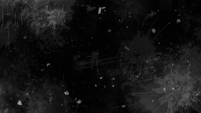 4K Cinematic dark grunge texture overlay featuring chaotic white paint splatters, messy drops, and scattered debris on a black background for VFX compositing.
