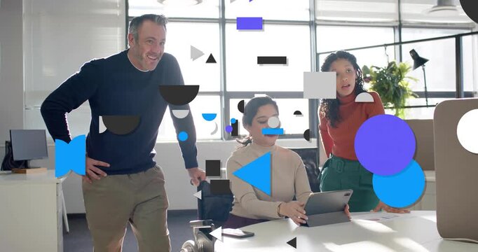Starting tablet demo woman in wheelchair while team business-wear pointing in open office, graphics