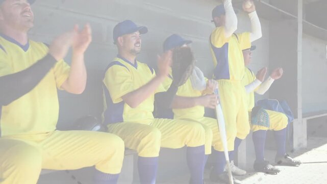 Vertical video: Baseball team shifting in dugout after big hit, passing gloves and bat, celebrating