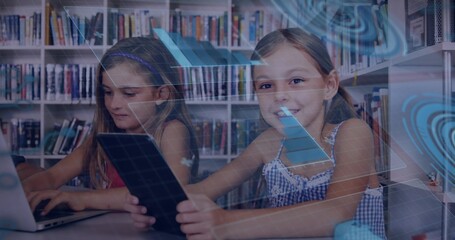 Typing on laptop left girl wearing dress, right girl holding tablet at library shelves, HUD overlay © vectorfusionart