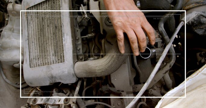 Inspecting bare right hand reaching into car engine bay, touching wrapped hose, filler, white frame