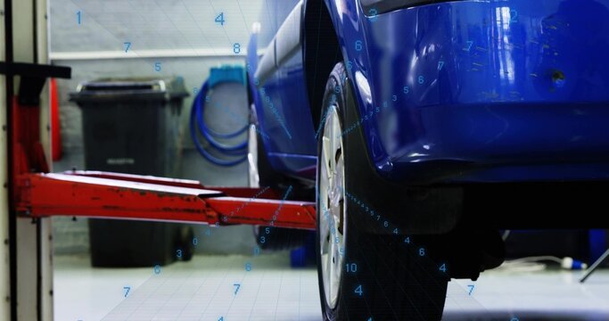 Displaying blue car rear-right rising in repair, with wheel, red hydraulic lift arm, grid overlay