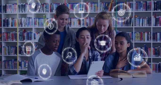 Gathering five students leaning and focusing on white tablet at library, in casual tops, HUD icons