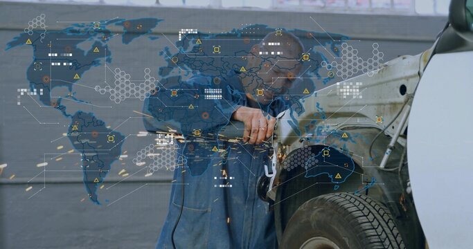 Grinding blue-coverall tech using grinder on right fender in garage sending sparks over map overlay