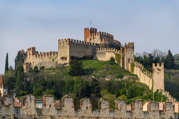 Fototapeta premium Medieval Wall Climbing the Hillside at Soave, Italy