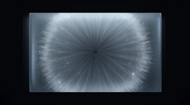 Abstract artistic rendering of a bright radiating light source inside a rectangular prism