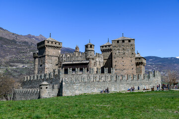 Fototapeta premium Medieval stone towers and walls of Fenis Castle - Castello di Fenis, Aosta Valley - Valle d’Aosta, Italy