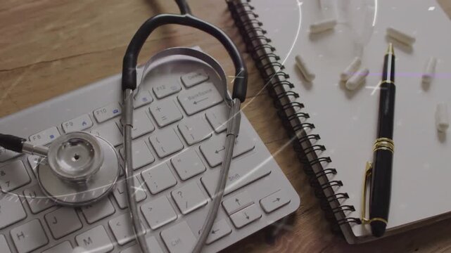 Vertical video: Camera panning right across desk as overlays sweep, revealing stethoscope and pills