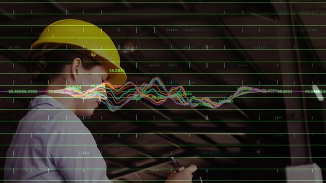 Engineer raising right hand, pointing at waveform overlay, then recording readings on clipboard