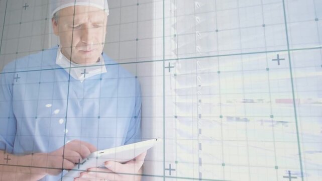 Holding doctor tapping white tablet at clinic window, wearing scrubs, mask-down, grid, copy space