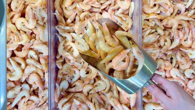 Buying shrimps at the grocery store	