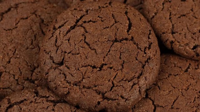 Heap Chocolate cookies close up, rotation