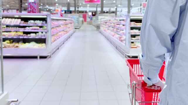 Choosing food from shelf at the supermarket,vegetables in the grocery section, Grocery stores 