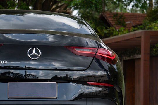 Black Mercedes CLA 200 rear emblem and taillight close up, Luxury sedan exterior rear end details