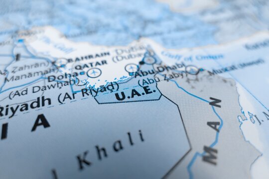 Map of UAE styled in grey color. Selective focus on label, close-up view
