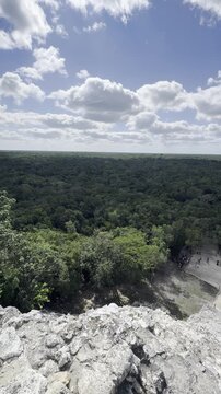 Man exploring the ancient mayan ruins of cob&aacute;. Cob&aacute;