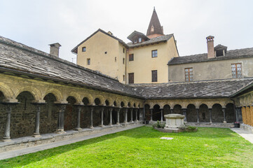 Fototapeta premium Cloister Courtyard with Bell Tower, Sant'Orso, Aosta, Italy