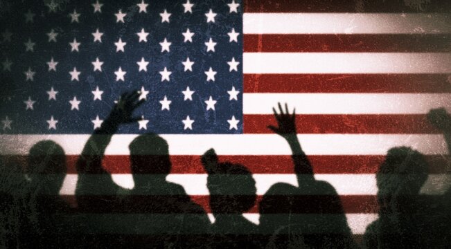 Protesters shadow against US flag protesting against president and war on Iran. People protesting against US president because of war and tension in middle East. US Iran israel war. Stop war.