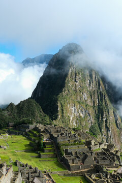Fog at Machu Picchu Ruins and Mountain
