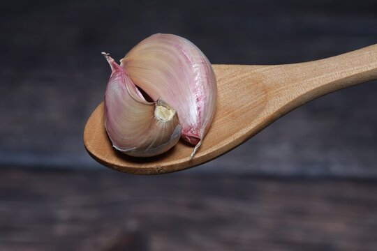 garlic on a wooden spoon