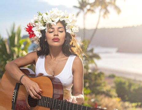 A woman with a floral headpiece closes her eyes, serenading with an acoustic guitar. A sunlit outdoor scene