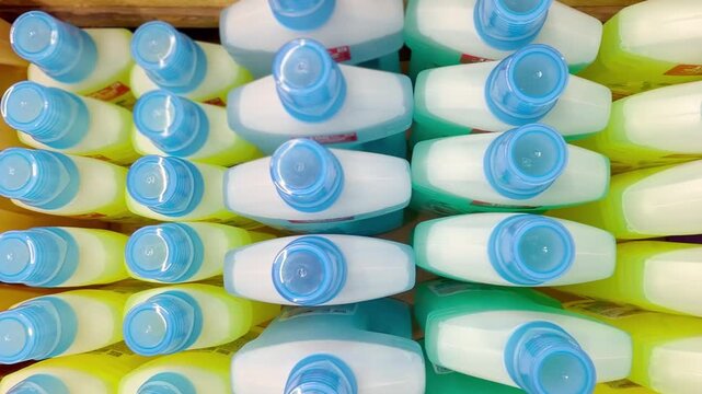 Choosing washing powder ,detergent,liquids at the Groceries.