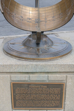 sundial and North-South Marker "Toronto Time" at 10 King's College Rd plaque with inscription