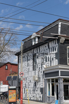 mural on the exterior wall of Warby Parker Queen Street West, 684 Queen St W and Euclid Av, Toronto