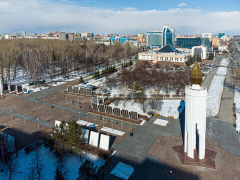 Aerial top-down drone view of the "Candle of Memory" memorial stele on Memory Square (Ploshchad Pamyati) in Tyumen, Russia, April 7, 2021