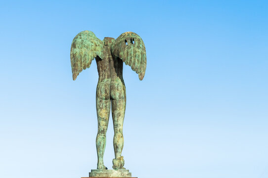 Ortigia, Sicily, Italy - October 1, 2024: The sculpture Ikaria by Polish artist Igor Mitoraj located near Castello Maniace in Ortigia.
