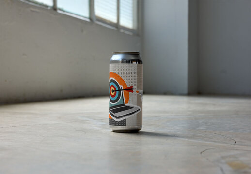 Mockup of a 12 Oz Can on a Plain Floor