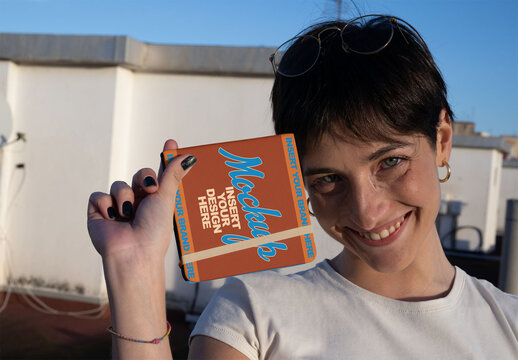 Front Cover of a square notepad with colored ribbon