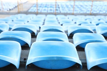 Naklejka premium blue seats in a stadium