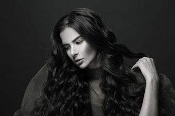 Fototapeta premium Fashionable beautiful woman with long hair, retro black and white portrait