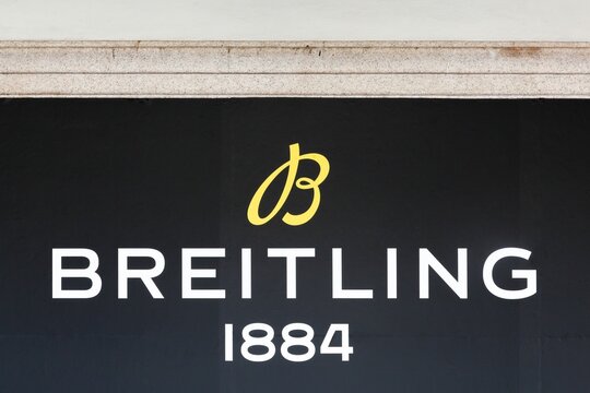 Geneva, Switzerland - July 10, 2023: Breitling logo on a wall. Breitling is a Swiss luxury watchmaker founded in 1884 in Saint-Imier, Switzerland, by Leon Breitling