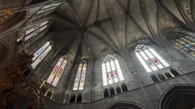Soaring Gothic Nave and Pillars of the Narbonne Cathedral Interior