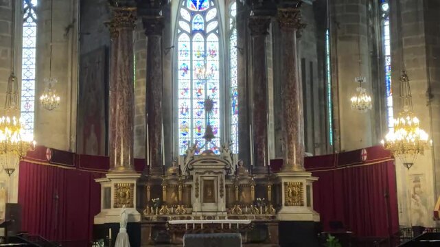 Soaring Gothic Nave and Pillars of the Narbonne Cathedral Interior