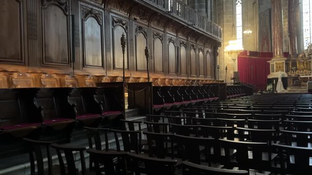 Row of Traditional Wooden Chairs Inside the Narbonne Cathedral