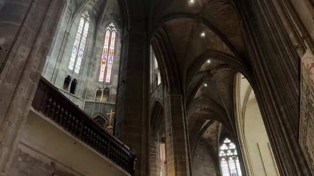 Soaring Gothic Nave and Pillars of the Narbonne Cathedral Interior