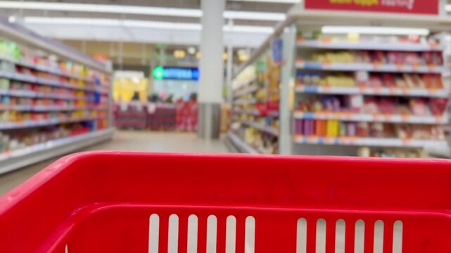 Choosing food from shelf at the supermarket,vegetables in the grocery section, Grocery stores 