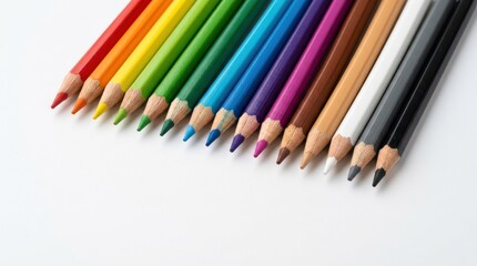 Fototapeta premium A vibrant spectrum of colored pencils arranged diagonally on a clean white background