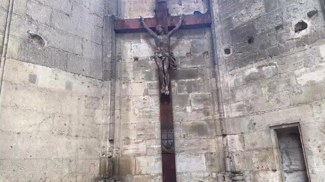 Crucifix Mounted on the Exterior Stone Walls of Narbonne Cathedral