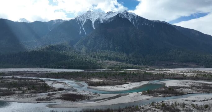 Aerial view of beautiful glacier in high altitude mountains landscape